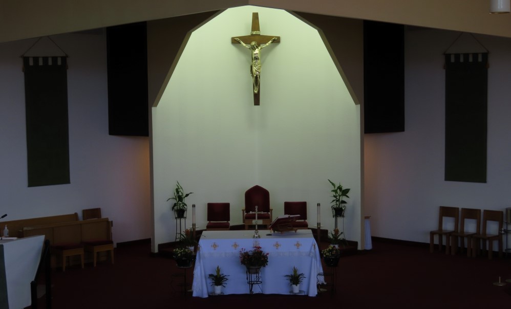 View of sanctuary of the church with altar and crucifix